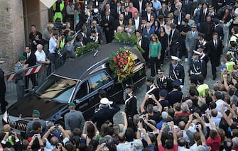 Hundreds gathered at the cathedral of Modena for the funeral of Luciano Pavarotti. The funeral was held in Modena's Duomo on September 8, 2007 in Modena, Italy. Pavarotti died of pancreatic cancer on Thursday September 6 in his home, aged 71. (Photo by Daniele Venturelli/WireImage)