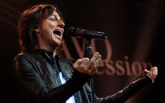 Italian singer Gianna Nannini performs her act on stage during a concert in Basel, Switzerland, late Sunday, November 3, 2002. (KEYSTONE/Markus Stuecklin) 