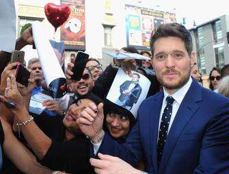 HOLLYWOOD, CA - NOVEMBER 16:  Singer Michael BublÃ© signs autographs at the Star Ceremony On The Hollywood Walk Of Fame held on November 16, 2018 in Hollywood, California.  (Photo by Albert L. Ortega/Getty Images)