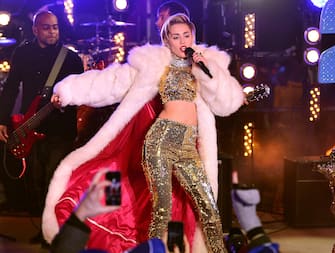 NEW YORK, NY - DECEMBER 31:  Miley Cyrus performs at Dick Clark's New Year's Rockin' Eve with Ryan Seacrest 2014 in Times Square on December 31, 2013 in New York City.  (Photo by James Devaney/WireImage)