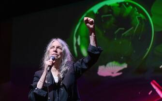 GLASGOW, SCOTLAND - OCTOBER 31: Patti Smith performs on stage for "Pathway To Paris" at Theatre Royal on the opening eve of the United Nations Climate Change Conference, COP26, on October 31, 2021 in Glasgow, Scotland. (Photo by Roberto Ricciuti/Redferns)