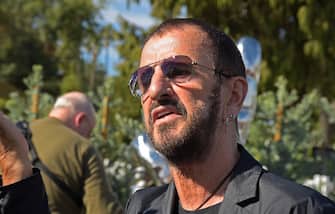 1185123737 BEVERLY HILLS, CALIFORNIA - NOVEMBER 02: Musician Ringo Starr attends a public art dedication for his donated sculpture "Peace and Love" at Beverly Gardens Park on November 02, 2019 in Beverly Hills, California. (Photo by Michael Tullberg/Getty Images)