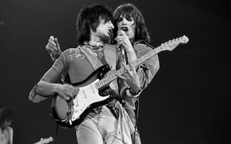 ATLANTA - JULY 30: (L-R) Guitarist Ronnie Wood and singer-frontman Mick Jagger perform with The Rolling Stones at the Omni Coliseum on July 30, 1975 in Atlanta, Georgia. (Photo by Tom Hill/WireImage)