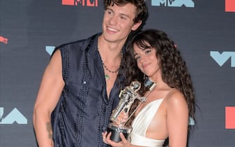 epa07796607 Canadian singer-songwriter Shawn Mendes (L) and American-Cuban singer-songwriter Camila Cabello (R) pose with the Best Collaboration Award in the Press Room during the 2019 MTV Video Music Awards at the Prudential Center in Newark, New Jersey, USA, 26 August 2019.  EPA/DJ JOHNSON