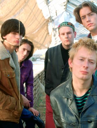 Portrait of Radiohead (Thom Yorke, Jonny Greenwood, Ed O'Brien, Colin Greenwood and Phil Selway) photographed in the early 1990's.;    (Photo by AJ Barratt/Avalon/Getty Images)