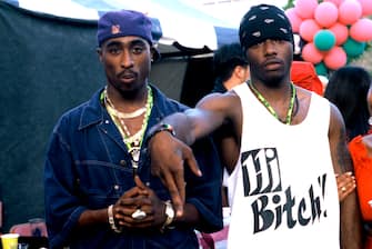 MOUNTAIN VIEW, CA - AUGUST 1: Tupac Shakur (L) and Treach from Naughty by Nature backstage at KMEL Summer Jam 1992 at Shoreline Amphitheatre on August 1, 1992 in Mountain View California. (Photo by Tim Mosenfelder/Getty Images)