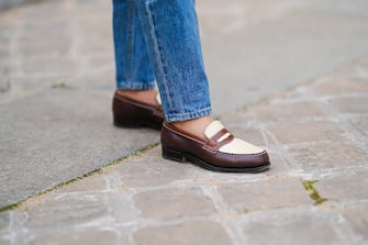 PARIS, FRANCE - NOVEMBER 25: Noa Souffir wears blue jeans, brown and white leather moccasin shoes from JM Weston, on November 25, 2020 in Paris, France. (Photo by Edward Berthelot/Getty Images)