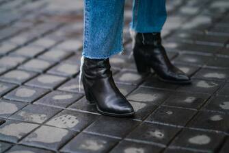 PARIS, FRANCE - DECEMBER 03: Sara Carnicella wears blue denim jeans, black leather pointy boots, outside the Pellegrino x Herve Leroux : Launch Party, on December 03, 2020 in Paris, France. (Photo by Edward Berthelot/Getty Images)