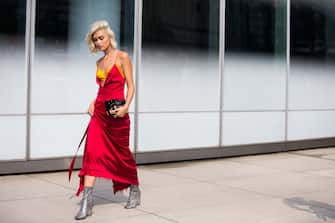 NEW YORK, NY - SEPTEMBER 10:  Sarah Ellen in a red slip dress, yellow bra top, Prada wallet, and silver sparkly booties outside the Dion Lee show at Pier 59 on September 10, 2016 in New York City.  (Photo by Melodie Jeng/Getty Images)