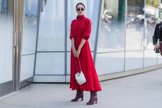 NEW YORK, NY - SEPTEMBER 13: Evangelie Smyrniotaki  wearing red dress seen in the streets of Manhattan outside Delpozo during New York Fashion Week on September 13, 2017 in New York City. (Photo by Christian Vierig/Getty Images)
