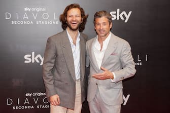 Italian actor Alessandro Borghi and American actor Patrick Dempsey during the photocall for the press presentation of the second season of Devils, produced by Sky Original.  Milan (Italy), April 8th, 2022 (Photo by Marco Piraccini / Marco Piraccini Archive / Mondadori Portfolio via Getty Images)