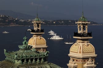 MONACO - JUNE 30:  Yachts pictured in the Harbour near the Monte Carlo Casino during preparations ahead of the Royal Wedding of Prince Albert II of Monaco to Charlene Wittstock on June 30, 2011 in Monaco. The civil ceremony will take place in the Throne Room of the Prince's Palace of Monaco on July 1, followed by a religious ceremony to be conducted in the main courtyard of the Palace on July 2. With her marriage to the head of state of Principality of Monaco, Charlene Wittstock will become Princess consort of Monaco and gain the title, Princess Charlene of Monaco. Celebrations including concerts and firework displays are being held across several days, attended by a guest list of global celebrities and heads of state.  (Photo by Dean Mouhtaropoulos/Getty Images)