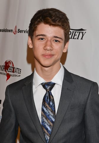 BEVERLY HILLS, CA - SEPTEMBER 19:  Actor Uriah Shelton attends the 12th Annual Heller Awards at The Beverly Hilton Hotel on September 19, 2013 in Beverly Hills, California.  (Photo by Vivien Killilea/WireImage)