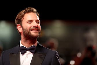 VENICE, ITALY - SEPTEMBER 01: Alessandro Borghi walks the red carpet ahead of the "Wasp Network" screening during the 76th Venice Film Festival at Sala Grande on September 01, 2019 in Venice, Italy. (Photo by Tristan Fewings/Getty Images)
