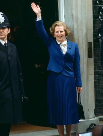 LONDON, UNITED KINGDOM - MAY 04:  Prime Minister, Margaret Thatcher, Standing Waving To The Crowds Of Wellwishers Outside 10 Downing Street After Her Election Victory.  (Photo by Tim Graham/Getty Images)
