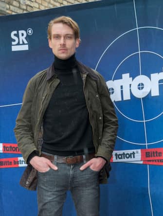 13 March 2019, Saarland, Sankt Ingbert: Daniel StrÃ¤Ã er, as Chief Inspector Adam SchÃ¼rk in the crime scene of the SaarlÃ¤ndischer Rundfunk (SR), stands in front of a crime scene at a press event. The first case of the new investigative team is currently being filmed in Saarland. Photo: Oliver Dietze/dpa (Photo by Oliver Dietze/picture alliance via Getty Images)