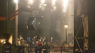 Crew members set up in-between shots. The filming of Peaky Binders seasons 6 starts filming in Manchester City centre. The are of Castlefield, in Manchester, has been transformed, pictured in Manchester, February 24 2021.