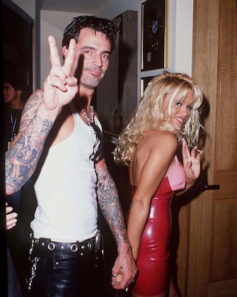 Tommy Lee and Pamela Anderson during Hard Rock Hotel & Casino Las Vegas Grand Opening Party Hosted by Peter Morton at Hard Rock Hotel & Casino in Las Vegas, Nevada, United States. (Photo by SGranitz/WireImage)