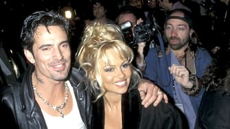 Tommy Lee And Pamela Anderson during Hard Rock Hotel & Casino Las Vegas Grand Opening Party Hosted by Peter Morton at Hard Rock Hotel & Casino in Las Vegas, Nevada, United States. (Photo by Jim Smeal/Ron Galella Collection via Getty Images)