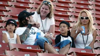 Pamela Anderson,Tommy Lee and 2 children Brandon Thomas and Dylan Jagger watch the X Games - Moto X Freestyle competition at the AL Coliseum in Los Angeles, Calif. on Saturday August 16, 2003. *Exclusive* ***Exclusive*** (Photo by Chris Polk/FilmMagic)