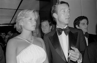 1216411242 Close-up of photojournalist Susan Ford and Halston (born Roy Halston Frowick, 1932 - 1990) as they arrive at the Four Seasons (for a Martha Graham reception), New York, New York, May 17, 1977. (Photo by Allan Tannenbaum/Getty Images)