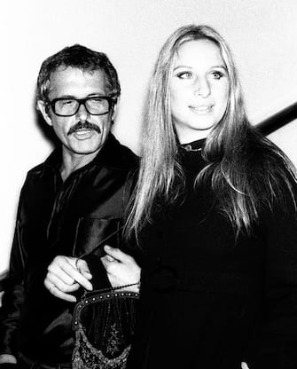 Barbra Streisand and Joe Eula attend Valentino Fashion Party on September 27, 1970 at the Pierre Hotel in New York City. (Photo by Ron Galella/Ron Galella Collection via Getty Images)