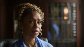 Dr. Andi Grant (Merrin Dungey) in a scene from the "Rubber (Wo)man: Part One" episode of AMERICAN HORROR STORIES.