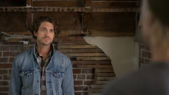 (L): Adam (Aaron Tveit) in a scene from the "Rubber (Wo)man: Part Two" episode of AMERICAN HORROR STORIES.