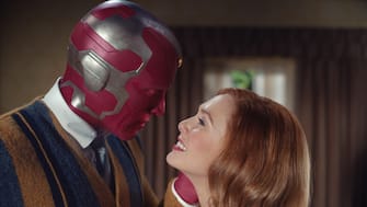 (L -R):  Paul Bettany as VIsion and Elizabeth Olsen as Wanda Maximoff in Marvel Studios' WANDAVISION exclusively on Disney+. Photo courtesy of Marvel Studios. ©Marvel Studios 2020. All Rights Reserved.