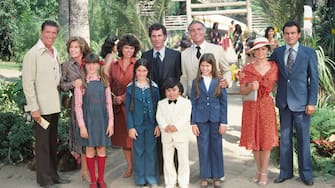 UNITED STATES - JANUARY 20:  FANTASY ISLAND - "Return to Fantasy Island" - Season One - 1/20/78, In this romantic drama, several different stories played out at a remote island resort, where each visitior could have one lifelong dream fulfilled. Granting the wishes (with certain twists) and overseeing the island was the white-suited owner, Mr. Roarke (Ricardo Montalban, center, in white suit), his helper, Tattoo (Herve Villechaize, bottom center, in white suit) and Benson (George Maharis in recurring role, to Montalban's right). Also pictured, guest stars from left: Joseph Campanella and Pat Crowley (as Brian and Lucy Faber); Adrienne Barbeau (as Margo Dean); Karen Valentine and Horst Buchholz (as Janet and Charles Fleming).,  (Photo by ABC Photo Archives/Disney General Entertainment Content via Getty Images)