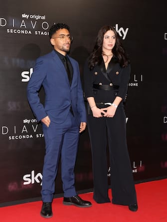 MILAN, ITALY - APRIL 07: Mohamed Ismail Bayed aka Momo and Raissa Russi attend the "Diavoli" Tv Series Second Season Premiere at The Space Odeon on April 07, 2022 in Milan, Italy. (Photo by Vittorio Zunino Celotto/Getty Images)