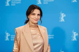 12 February 2022, Berlin: Actress Juliette Binoche is at the photocall of the competition film "AVEC AMOUR ET ACHARNEMENT" (BOTH SIDES OF THE BLADE). The 72nd International Film Festival will be held in Berlin from Feb. 10 to 20, 2022. Photo: Gerald Matzka/dpa (Photo by Gerald Matzka/picture alliance via Getty Images)