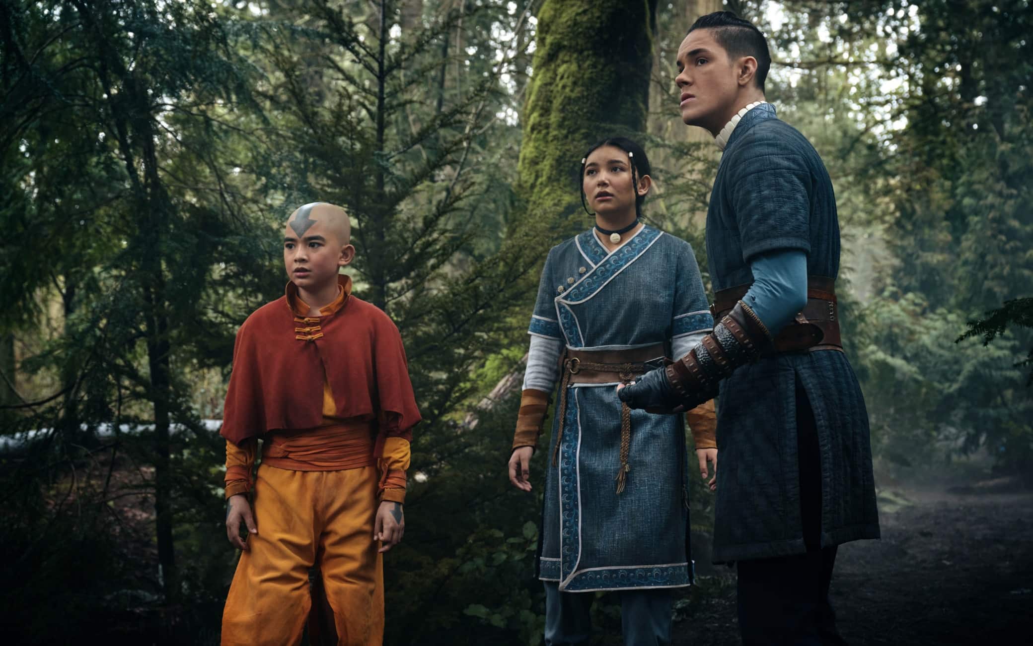 Avatar: The Last Airbender. (L to R) Gordon Cormier as Aang, Kiawentiio as Katara, Ian Ousley as Sokka in season 1 of Avatar: The Last Airbender. Cr. Robert Falconer/Netflix © 2023