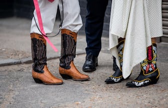 LONDON, ENGLAND - JUNE 09: Guests seen wearing cowboy boots outside Xander Zhou during London Fashion Week Men's June 2019 on June 09, 2019 in London, England. (Photo by Christian Vierig/Getty Images)