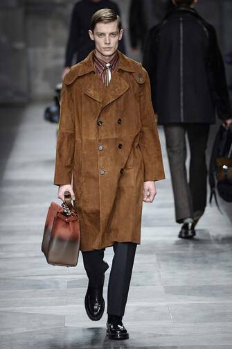 MILAN, ITALY - JANUARY 19:  A model walks the runway at the Fendi Autumn Winter 2015 fashion show during Milan Menswear Fashion Week on January 19, 2015 in Milan, Italy.  (Photo by Catwalking/Getty Images)
