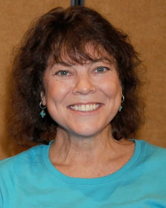 139222634 BURBANK, CA - JULY 18: Erin Moran poses at the The Hollywood Collectors & Celebrities Show at the Burbank Airport Marriott Hotel & Convention Center in Burbank, California on July 18, 2009. (Photo by Gregg DeGuire/FilmMagic)