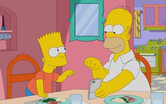 THE SIMPSONS: Homer and Marge attend Artie Ziff