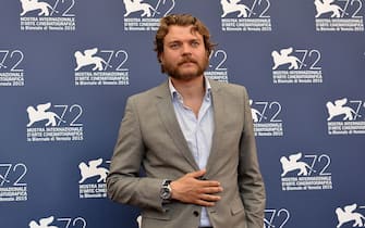 Actor Pilou Asbaek poses during the photocall of the movie "Krigen" (A War) presented in the Orizzonti selection at the 72nd Venice International Film Festival on September 5, 2015 at Venice Lido.  AFP PHOTO / TIZIANA FABI        (Photo credit should read TIZIANA FABI/AFP via Getty Images)
