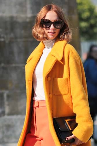 PARIS, FRANCE - OCTOBER 03:  Candela Novembre wearing a Rochas coat, Fendi sunglasses and Zara shoes, before the Elie Saab show during Paris Fashion Week SS16 on October 3, 2015 in Paris, France.  (Photo by EDWARD BERTHELOT/Getty Images)