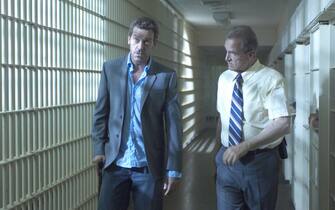 HOUSE:  House (Hugh Laurie, L) agrees to treat a death row inmate (guest star LL Cool J) who is stricken with a mysterious disease in the season premiere episode of HOUSE airing Tuesday, September 13 (9:00-10:00 PM ET/PT) on FOX.  Also pictured:  Marshall Bell (R).  ª©2005 FOX BROADCASTING COMPANY.  Cr:  Jamie Trueblood/FOX.