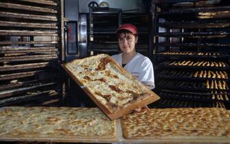 Recco, Italy, December 2010: Typical Genoese focaccia in the "La Rosa" bakery.  (Photo by Vittoriano Rastelli/Getty Images)