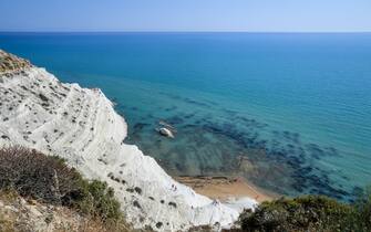 A picture taken on July 18, 2019 shows a view of Scala dei Tiurchi beach, near the village of Porto Empedocle, the native place of Italian writer Andrea Camilleri, author and creator  of "Inspector Salvo Montalbano", near Agrigento, Sicily. - Italian author Andrea Camilleri, who earned worldwide acclaim for his series of 30-odd whodunnits starring inspector Salvo Montalbano in the fictitious Sicilian city of Vigata, died on July 17, 2019 aged 93. (Photo by Andreas SOLARO / AFP)        (Photo credit should read ANDREAS SOLARO/AFP via Getty Images)