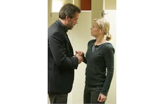 HOUSE: House (Hugh Laurie, L) fights to find proof of how a woman (guest star Samantha Morton, R) is trying to kill her husband with gold in the HOUSE episode "Clueless" airing Tuesday, March 28 (9:00-10:00 PM ET/PT) on FOX. ©2006 Fox Broadcasting Co. Cr: Chris Haston/FOX