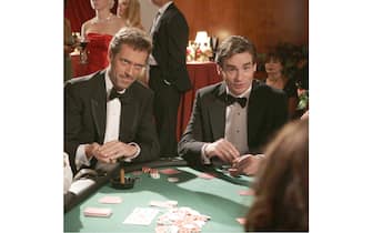 HOUSE:  House (Hugh Laurie, L) and Wilson (Robert Sean Leonard, R) hit the poker table at a hospital benefit in the HOUSE episode "All In" airing Tuesday, April 11 (9:00-10:00 PM ET/PT) on FOX.  ©2006 Fox Broadcasting Co.  Cr:  Isabella Vosmikova/FOX