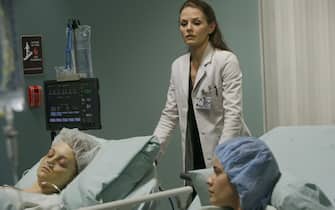 HOUSE:  Cameron (Jennifer Morrison, C) must make a tough choice when treating two patients (Jayma Mays (L) and Dahlia Salem (R)) in the HOUSE episode "Sleeping Dogs Lie" airing Tuesday, April 18 (9:00-10:00 PM ET/PT) on FOX.  ©2006 Fox Broadcasting Co.  Cr:  Isabella Vosmikova/FOX