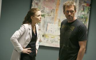 HOUSE:  House (Hugh Laurie, R) and Cameron (Jennifer Morrison, L) work fast to help a woman with insomnia in the HOUSE episode "Sleeping Dogs Lie" airing Tuesday, April 18 (9:00-10:00 PM ET/PT) on FOX.  ©2006 Fox Broadcasting Co.  Cr:  Isabella Vosmikova/FOX