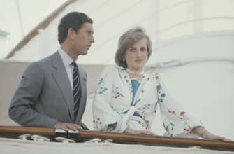 Prince Charles and Diana, Princess of Wales on board the Royal Yacht Britannia in Gibraltar, at the start of their honeymoon cruise, August 1981. She is wearing a floral silk dress by Donald Campbell. (Photo by Jayne Fincher/Princess Diana Archive/Getty Images)