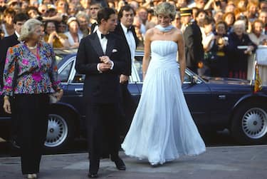 Prince Charles And Princess Diana Arriving At The Cannes Film Festival For A Gala Night In Honour Of  Actor Sir Alec Guinness.  The Princess Is Wearing A Pale Blue Silk Chiffon Strapless Dress With A Matching Chiffon Stole Designed By Fashion Designer Catherine Walker. They Are Greeted By The Lady Mayor Of Cannes.  (Photo by Tim Graham Photo Library via Getty Images)