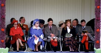 BRAEMAR, SCOTLAND - SEPTEMBER 06: (L-R) Queen Elizabeth II, Queen Elizabeth, the Queen Mother, Prince Charles, Prince of Wales, Sarah, Duchess of York and Prince Andrew, Duke of York attend the Braemar Highland Games on September 6, 1986 in Braemar, Scotland. (Photo by Anwar Hussein/Getty Images)