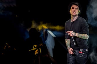 Fedez (Federico Leonardo Lucia), Italian rapper and music producer, performing on stage and holding a mic during the X Factor finale at Mediolanum Forum.  Assago, Italy, 10th December 2015 (Photo by Francesco Prandoni  Francesco Prandoni Archive  Mondadori via Getty Images)